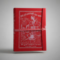 A red book with a decorative pattern and Devanagari script on the cover. It is bound by a red ribbon.