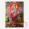 Colorful depiction of a deity on a tiger with intricate details and vibrant colors.