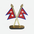 Crossed Nepal flags on a gold stand with a white background