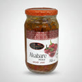 A glass jar of Akabare Pickle with a red patterned lid and a white label featuring red peppers, set against a plain white background.