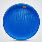 A round red plastic tray with a textured woven pattern and a small gold brand logo at the top, shown on a light gray background.