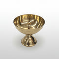 Gold-colored bowl on a white background