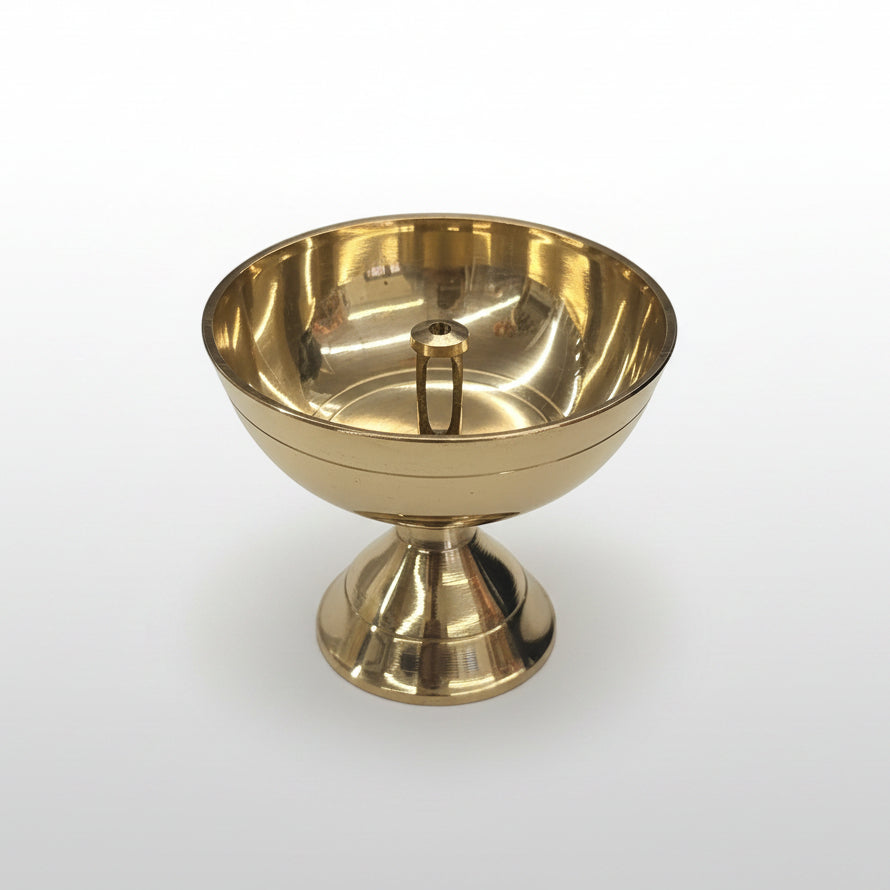 Gold-colored bowl on a white background