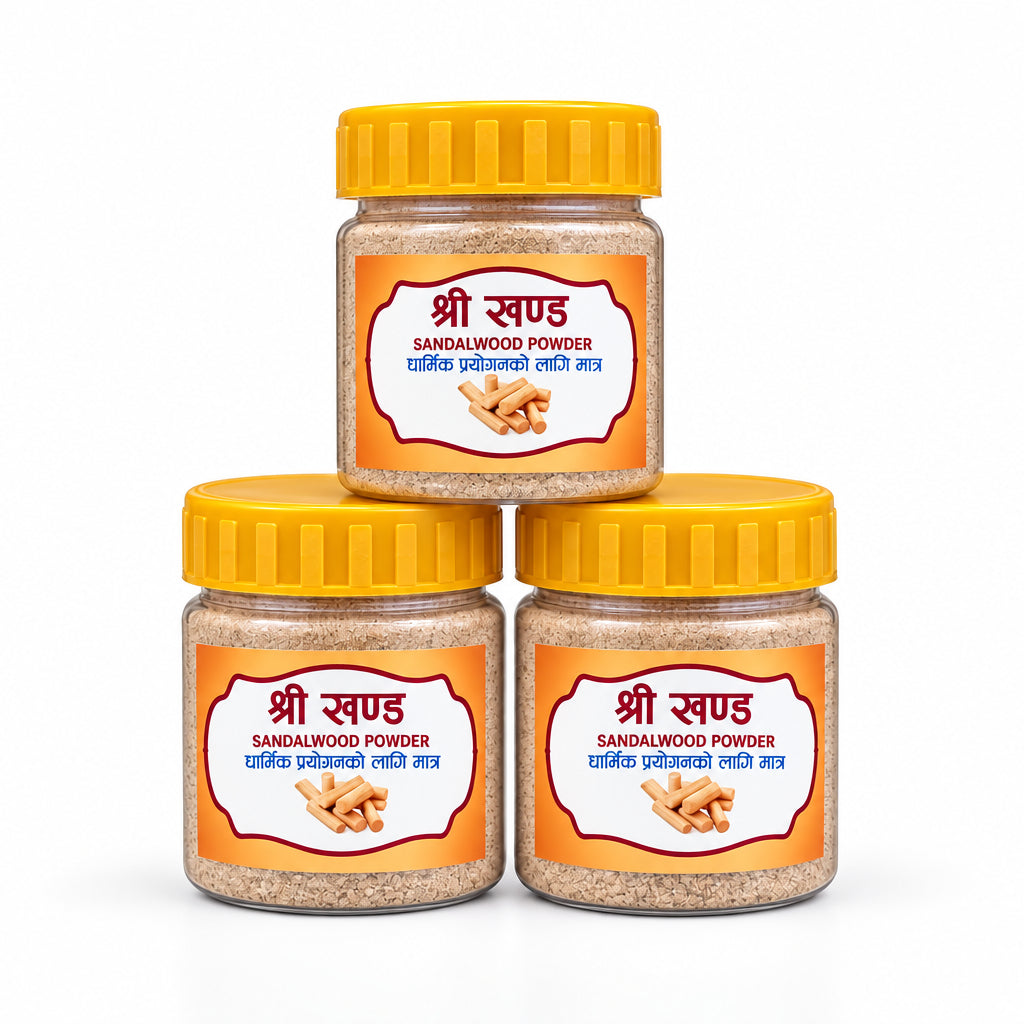 Three small jars of Shri Swaad Sandalwood Powder arranged in a pyramid stack on a white surface, with a blurred indoor background.