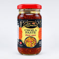 Jar of Choila Paste with a red lid on a white background
