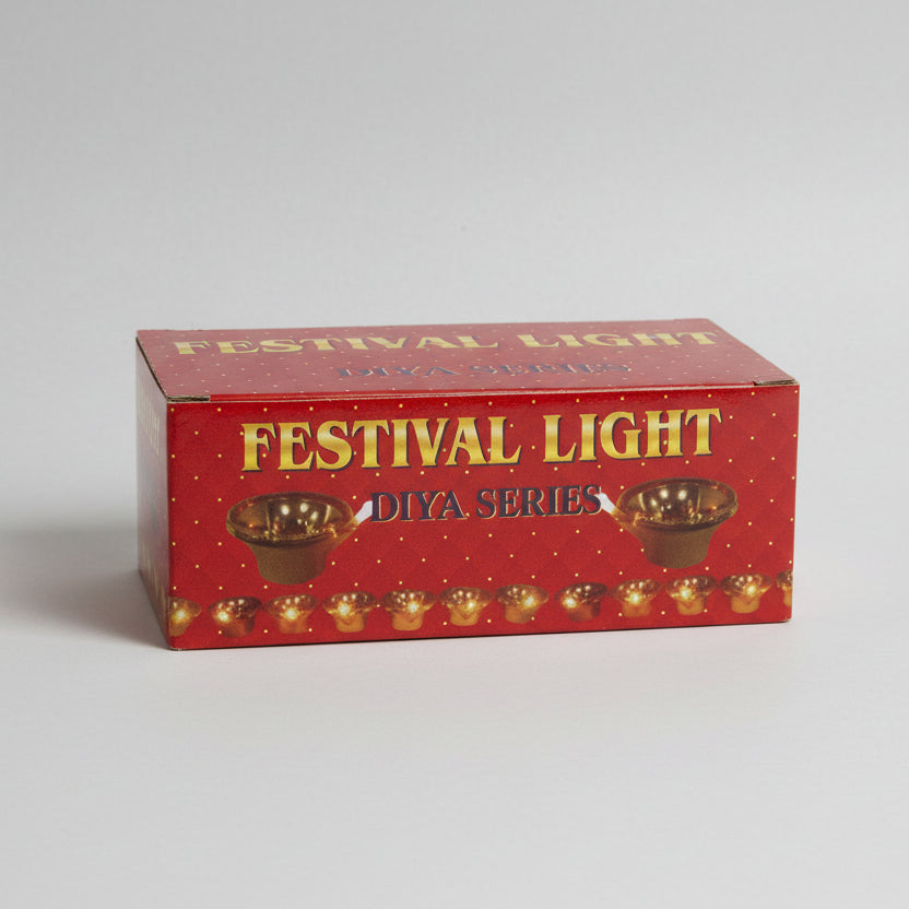 Box of festival lights labeled 'FESTIVAL LIGHT DIYA SERIES' with a red background and images of candle holders.