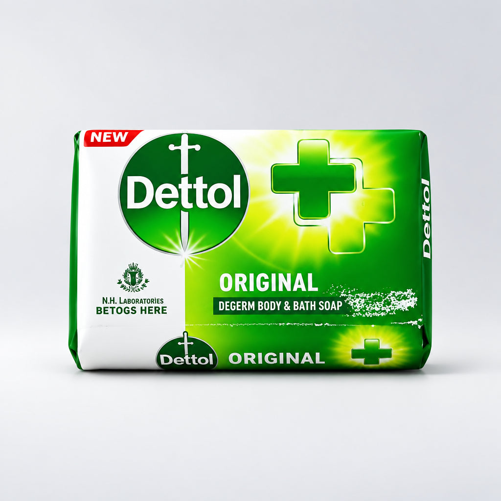 Dettol soap bar packaging on a reflective surface with a neutral background