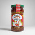 Jar of Druk Radish Dalla Pickle with a red label on a white background