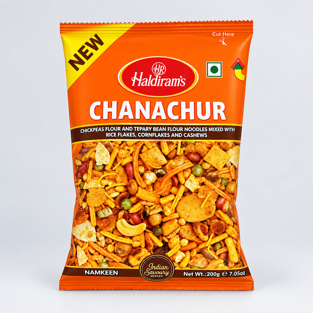 A packaged food product with branding 'Haldiram' and the product name 'Chanachur' displayed on the front. The package is orange in color with text and branding, indicating it is a new product.