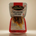 Packaged hot and spicy fish product with a red and white label on a light background