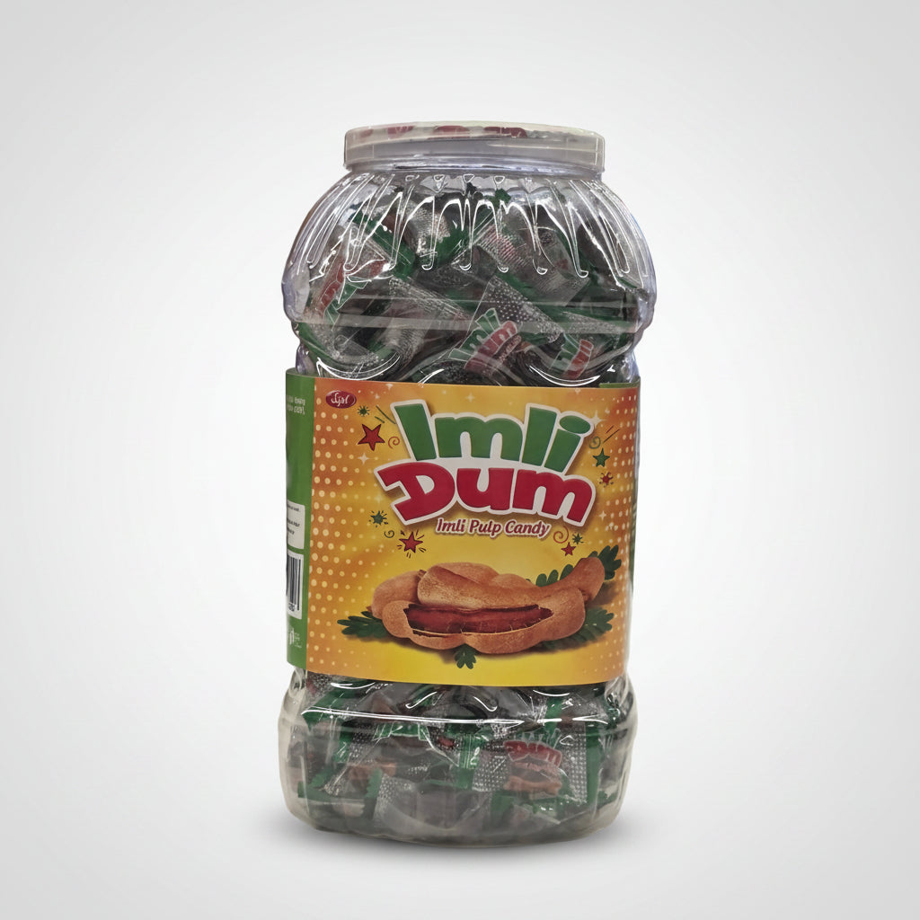 Jar of Imli Dum candy with a colorful label on a shelf.