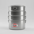 A silver aluminum momo pot with three compartments, each having a handle on the side.