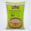 Bag of Natco whole green peas with a blurred store background