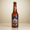 Nepal Ice beer bottle with a mountain logo on a white background