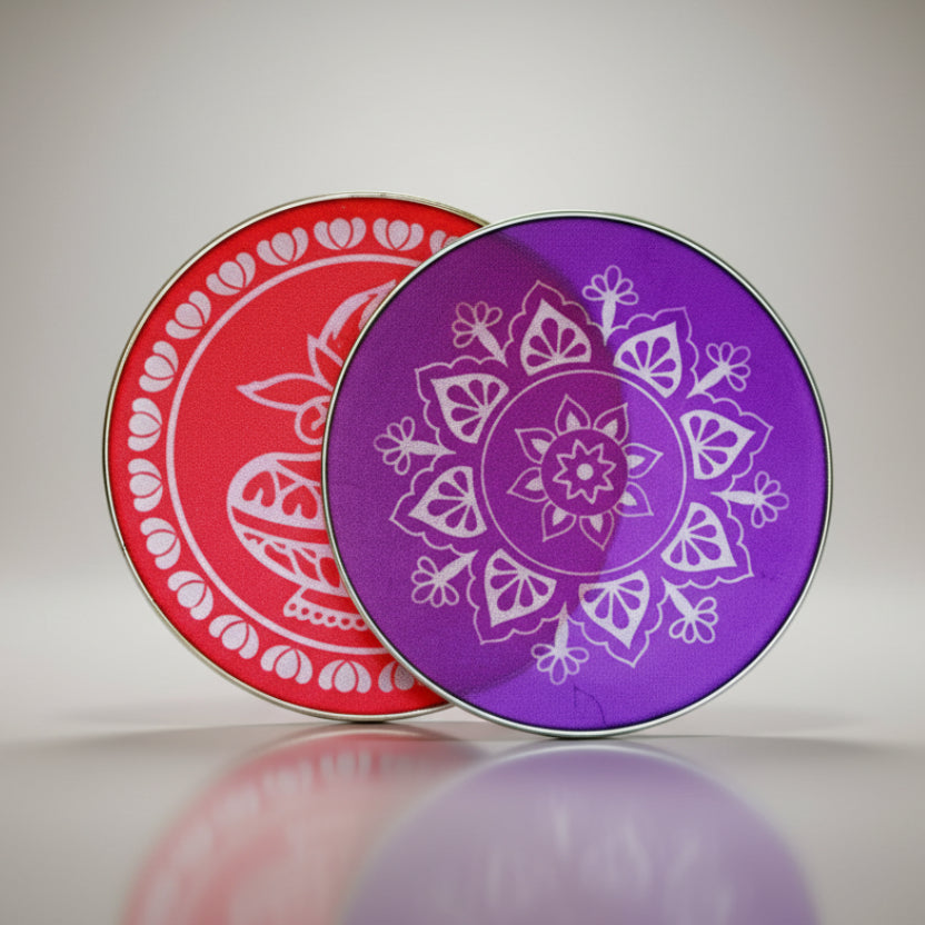 Two circular coasters with mandala designs, one red and one purple, on a white background.