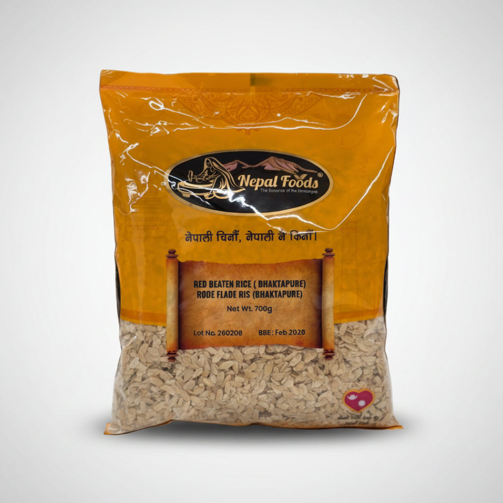 A 700g bag of Nepal Foods Red Beaten Rice (Bhaktapur) and Red Flare Ris (Bhaktapur) rice, featuring a bright orange-yellow packaging with a clear lower section showing the grains inside.