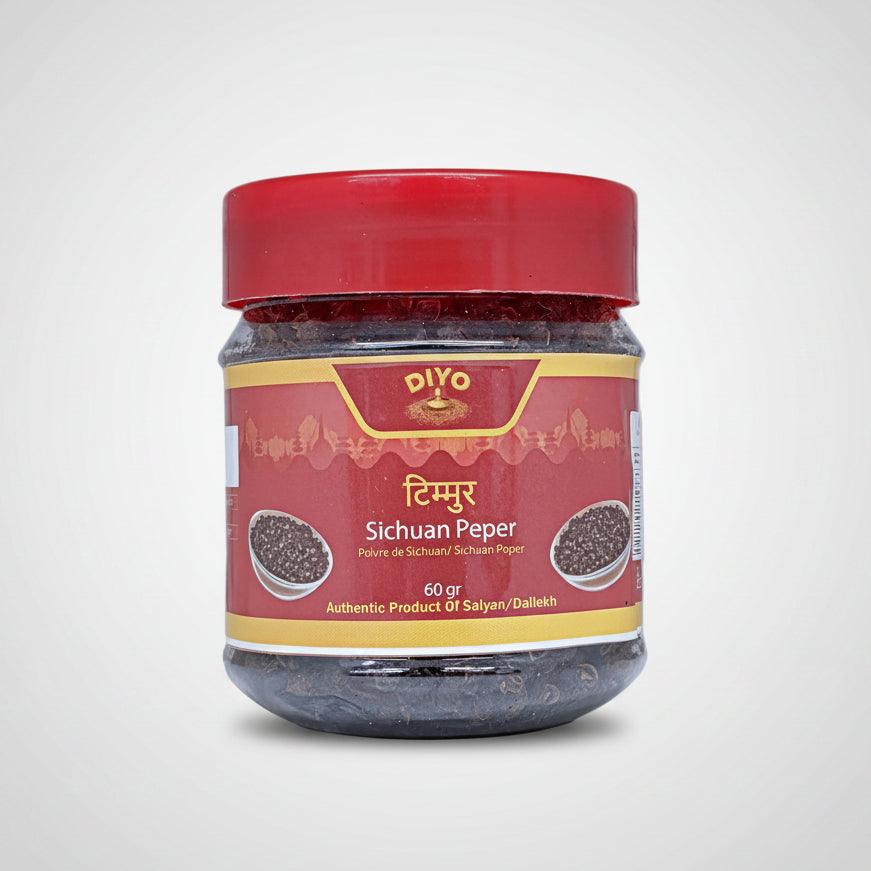 Jar of Sichuan pepper with a red lid on a white background
