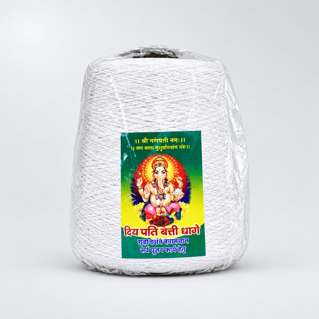 A bundle of white yarn or thread with a label featuring a colorful image of a deity, typically associated with Hindu religion.