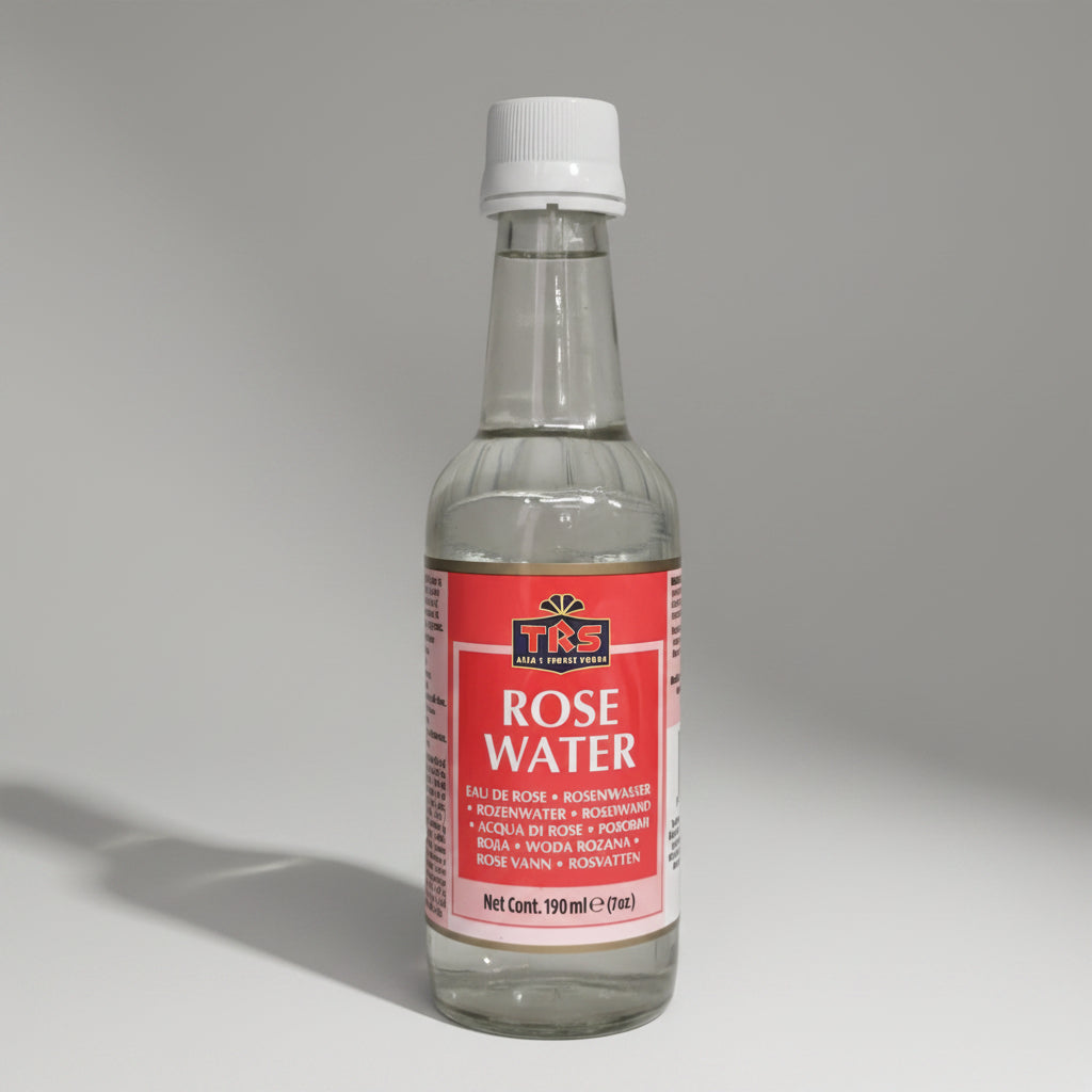 Bottle of TRS Rose Water on a metallic surface
