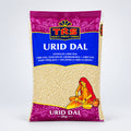 A packaged product of TRS Urid Dal, which is a type of pulse, with branding and information in a foreign language visible on the packaging.