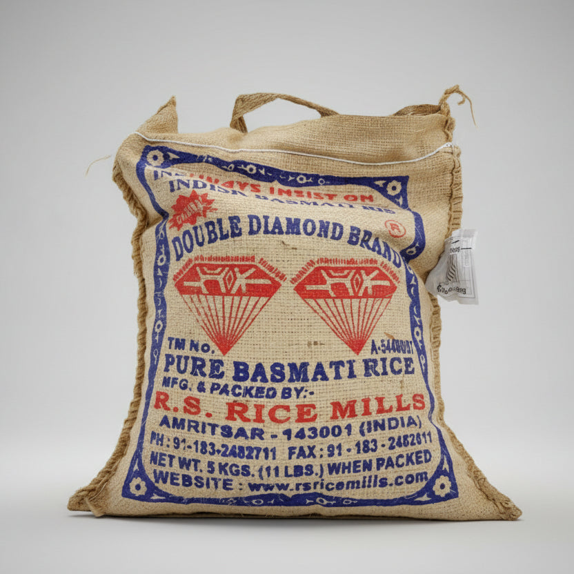 Jute bag with Double Diamond Brand Pure Basmati Rice packaging on a gray background