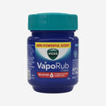 A 50ml jar of Vicks VapoRub Classic cough and cold relief balm with a teal cap and blue label, shown on a light gray background.