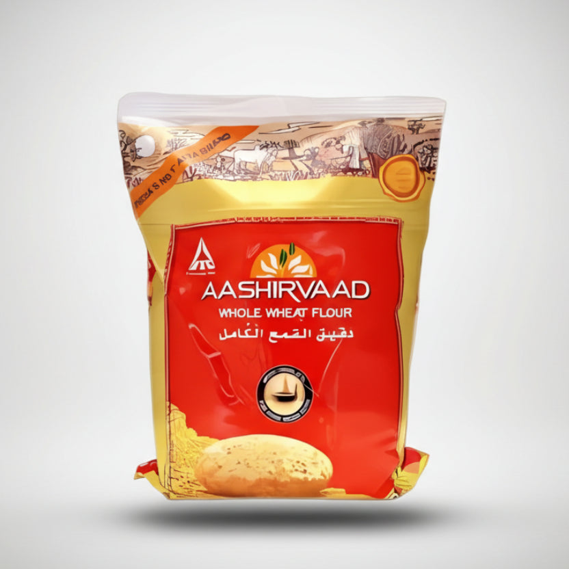 Aashirvaad whole wheat flour package on a white background