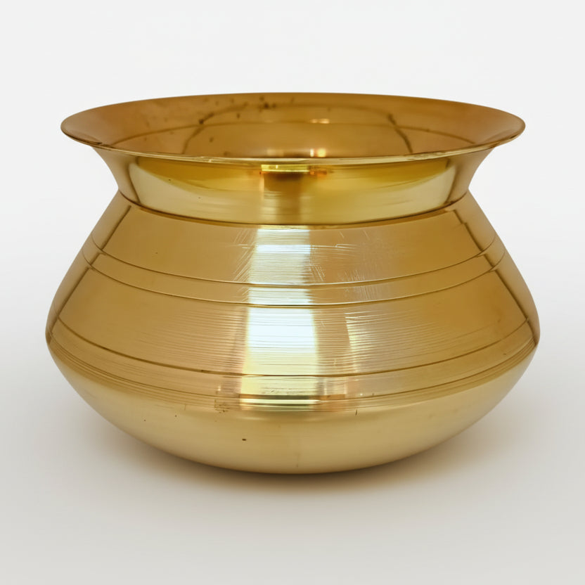 Brass pot on a white background