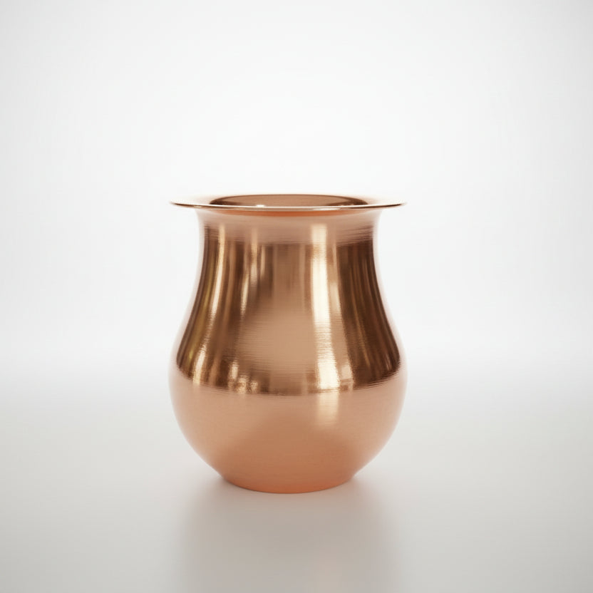 A copper-colored metal lota (vase) displayed against a neutral background.