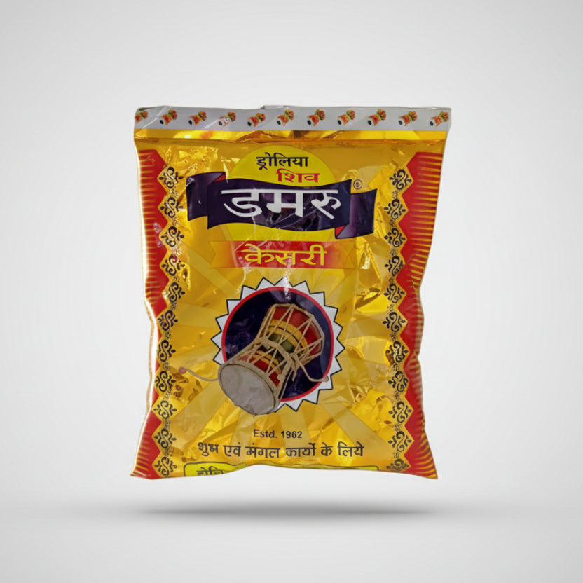 A packaged product with a predominantly yellow and red design, featuring text and an image of a golden object, likely to be a snack.
