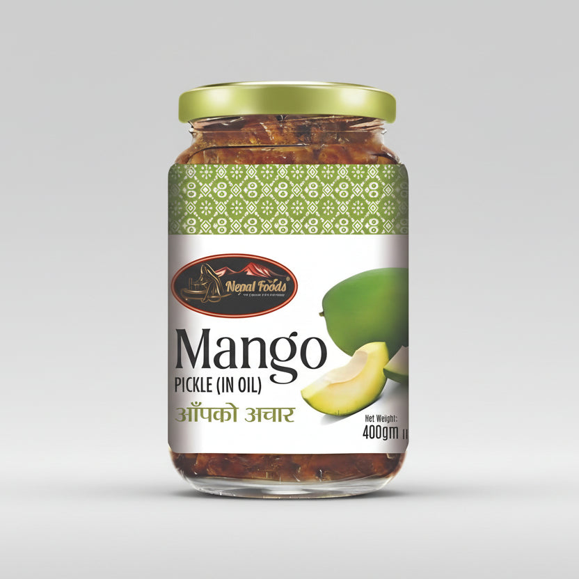 Jar of mango pickle with a green lid on a white background, featuring the Nepal foods brand.