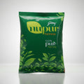 Green package of Godrej Nupur Henna with leaf design on a white background