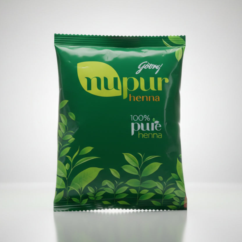 Green package of Godrej Nupur Henna with leaf design on a white background