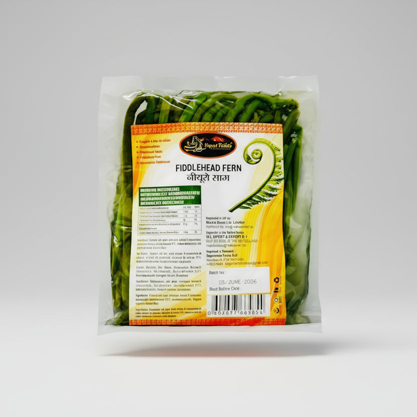 Packaged fiddlehead ferns with a label on a white background