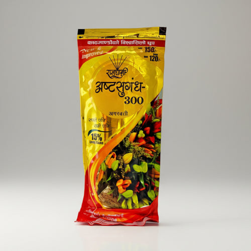 A pack of Agarbatti (incense sticks) in a yellow and red package with branding and product information displayed.