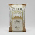 A 20kg bag of Heer Superior Basmati Rice with branding and text details.