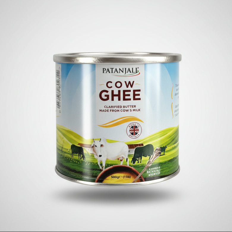 A can of Patanjali Cow Ghee displayed against a light background.