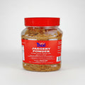 A plastic jar of Sakkhar Powder - 500g with a red label on a white background.