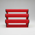 A red churi stand with multiple horizontal rods, likely made of metal, against a white background.